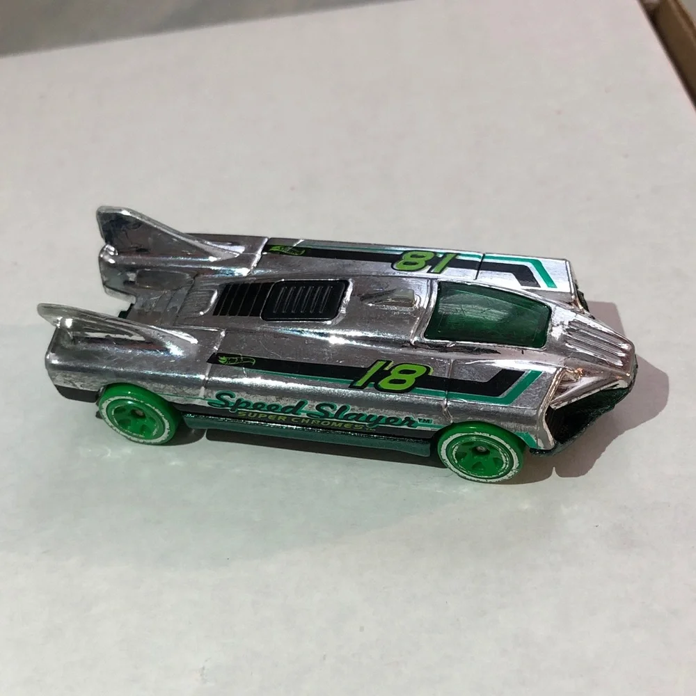 Silver and Green Chrome Super Slayer Racing Car